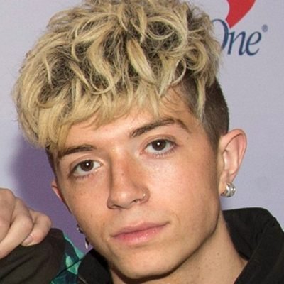 Ex-girlfriend of boyband singer charged in alleged murder-for-hire plot