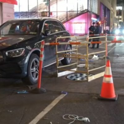 Woman dies after falling into manhole
