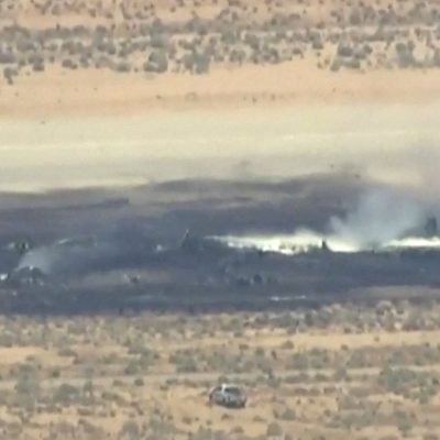 Eight presumed dead after US bomber crashes shortly after take-off